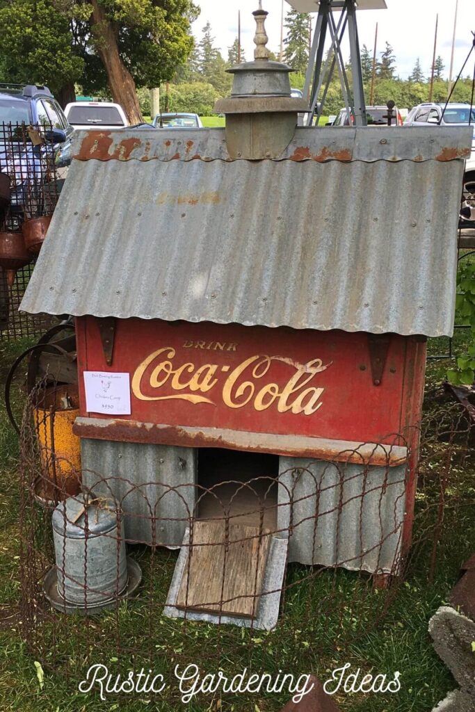 Rustic Gardening Ideas - Photo of a Rustic DIY Chicken Coop made out of a vintage Coca-Cola metal cooler and galvanized metal. If you're looking for rustic chicken coop ideas, this coop takes the prize. Made out of vintage materials, this chicken coop design would make the perfect rustic garden focal point.