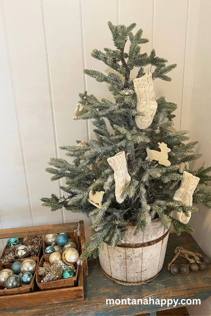 Creative Rustic Christmas Decorating Ideas - Photo of Small Christmas Tree in a Rustic Bucket with Mini Stockings 