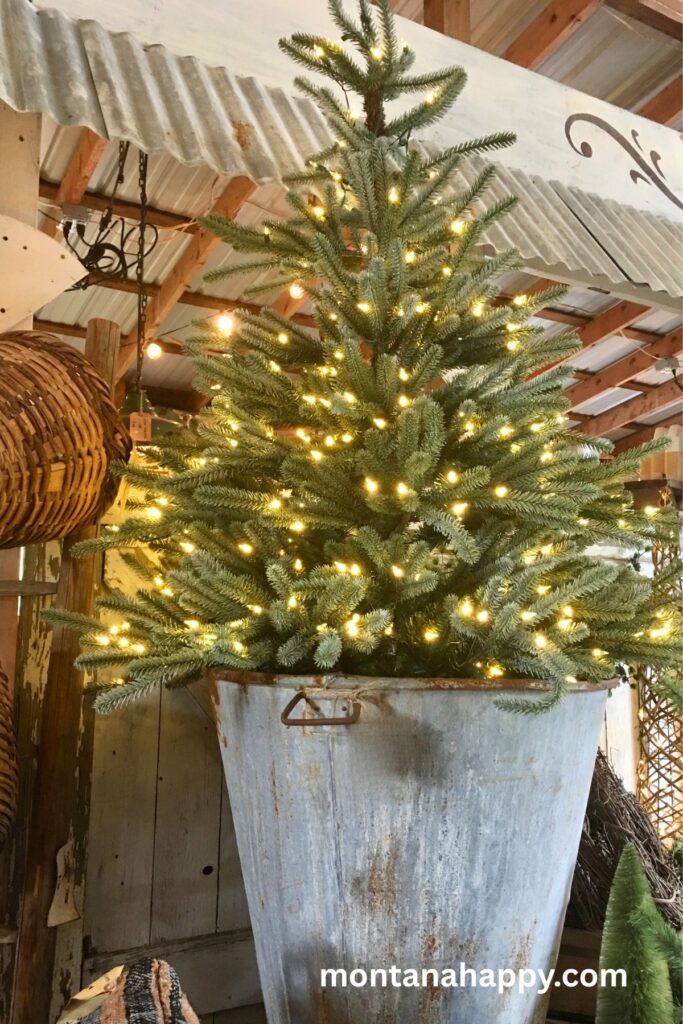 Rustic Christmas Decorating Ideas - Photo of Christmas Tree with White Lights in a Galvanized Bucket 