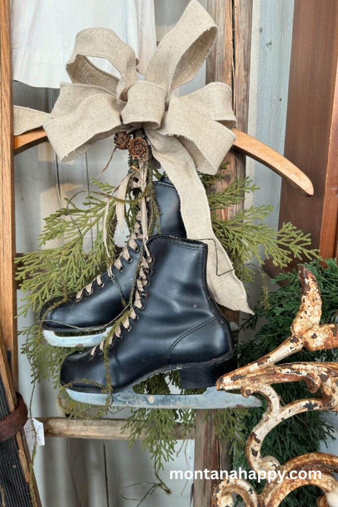 Rustic Christmas Decorations - Photo of Vintage Black Ice Skates with Greenery and Bow 