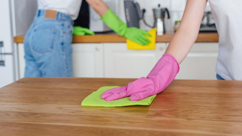 Hygge Cleaning Routine Ideas - Cleaning with a Friend - Photo of Two Women Cleaning