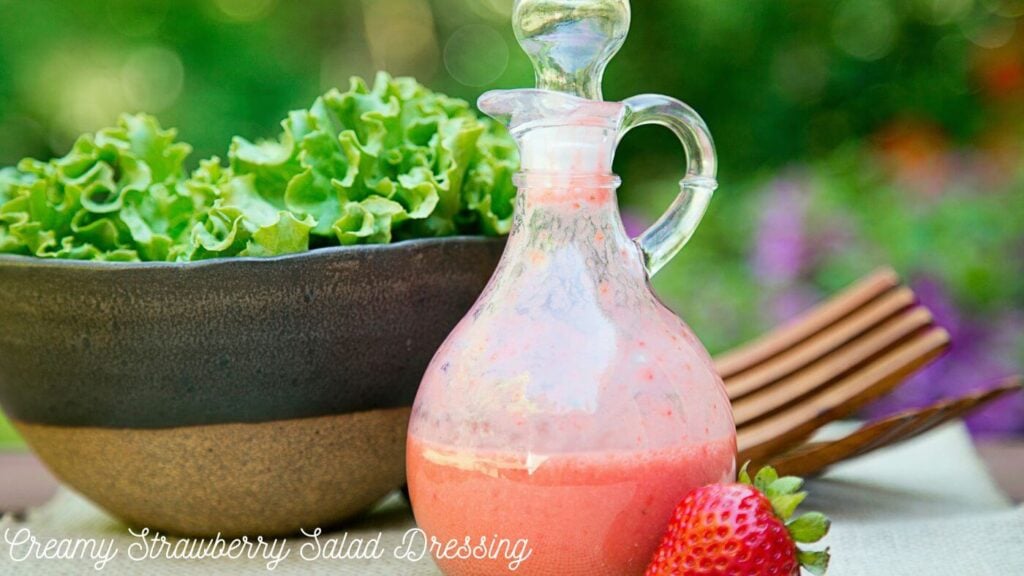 Photo of Creamy Strawberry Salad Dressing with a Bowl of Greens 