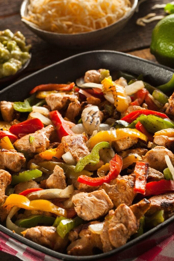 Homemade Fajita Seasoning Mix - Chicken Fajitas with Yellow Onions, Red Bell Peppers, and Yellow Bell Peppers