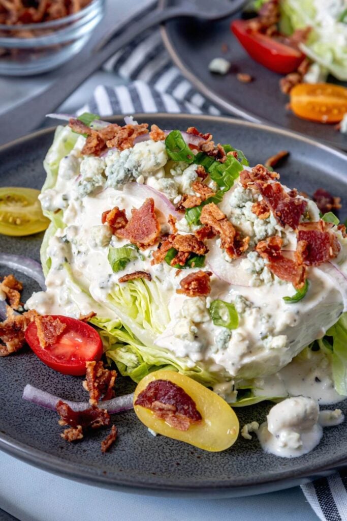 The Best Blue Cheese Dressing on top of a Wedge Salad