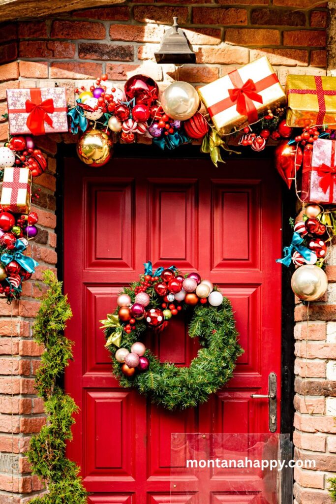 Creative Inexpensive Christmas Decorations - Photo of a Christmas present and ornament garland around the Door