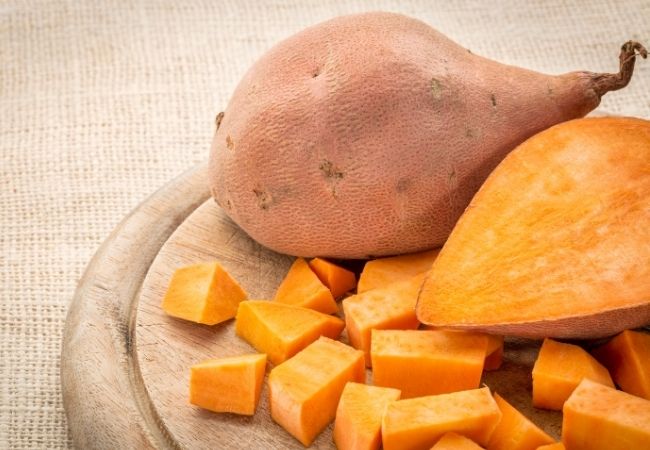 Cut up Sweet Potatoes on a Cutting Board