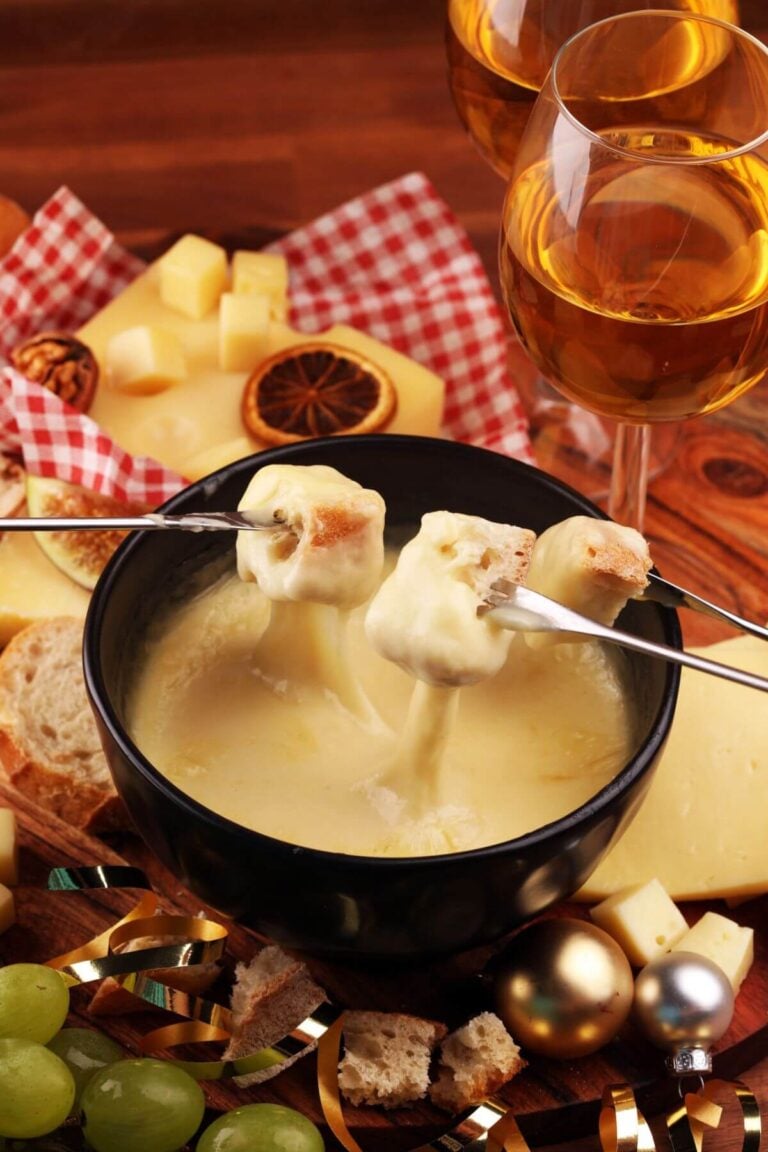 Elegant white and cream composition of fondue dippers arranged for ultra HD wallpaper aesthetic