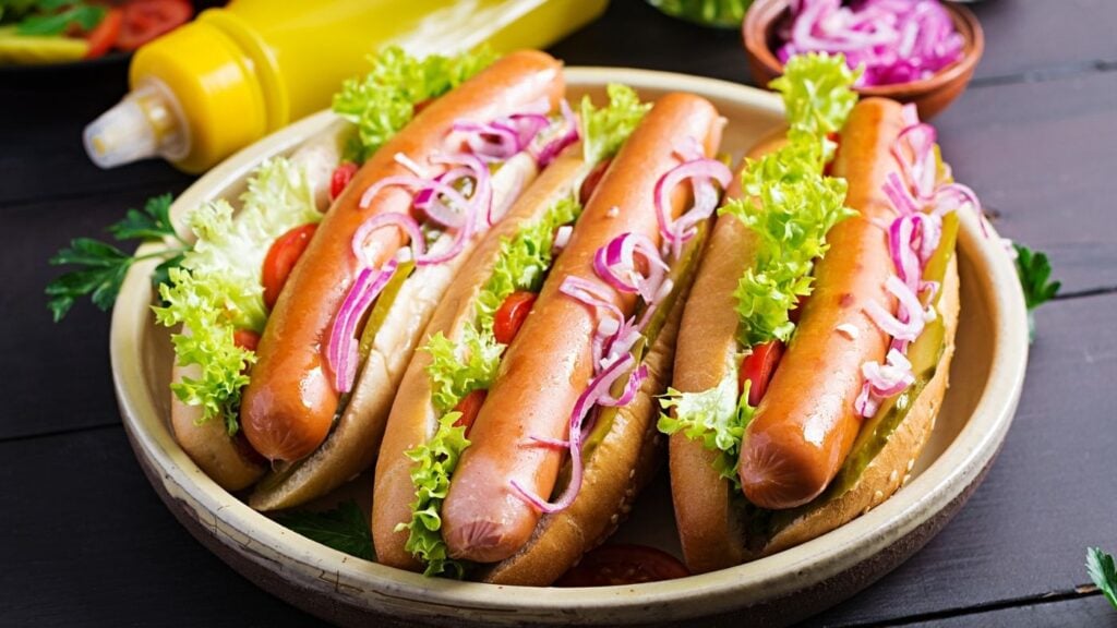 Quick Refrigerator Pickled Red Onions on hot dogs.