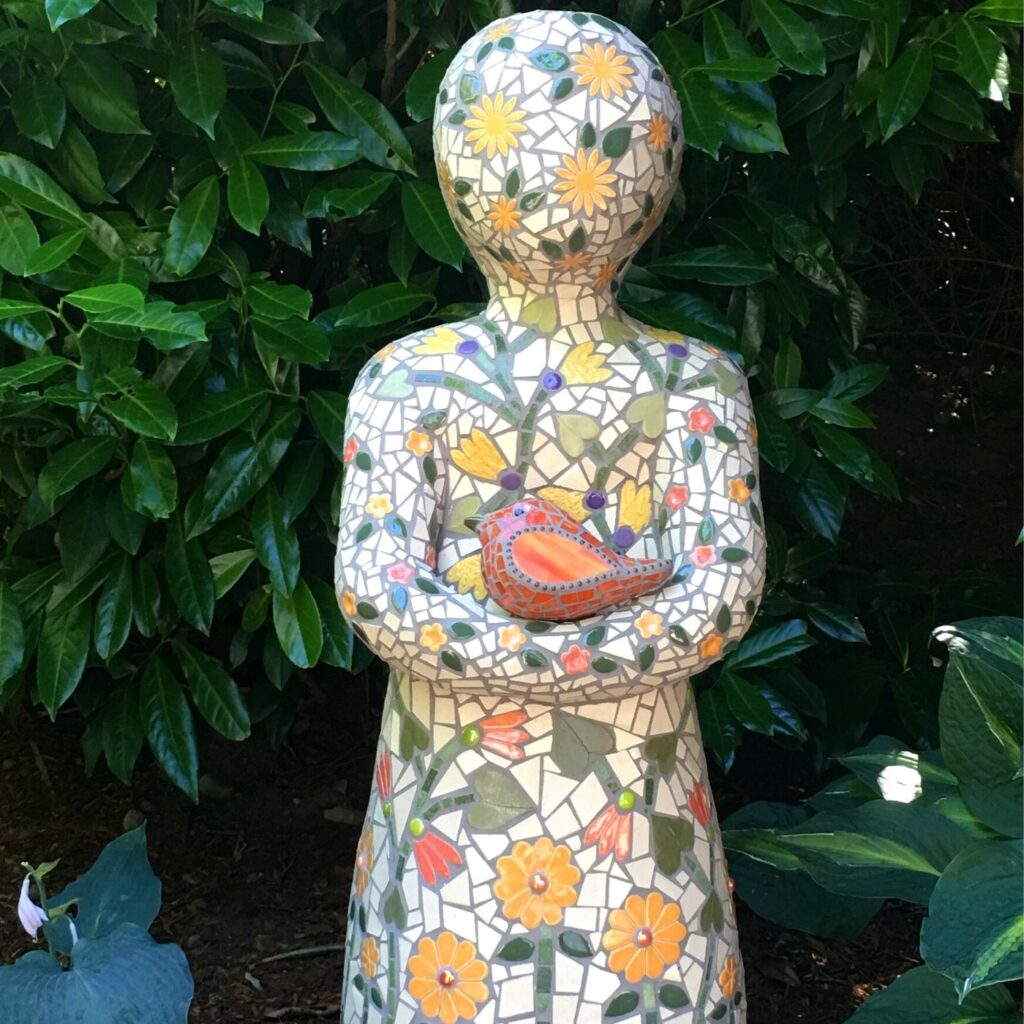Garden Art - Mosaic Statue of a child holding a bird