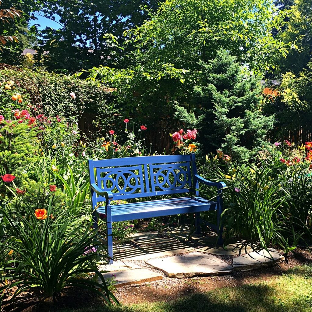 Fun Ideas for Garden Decor - Garden Focal Point - Garden Bench Surrounded by Flowers