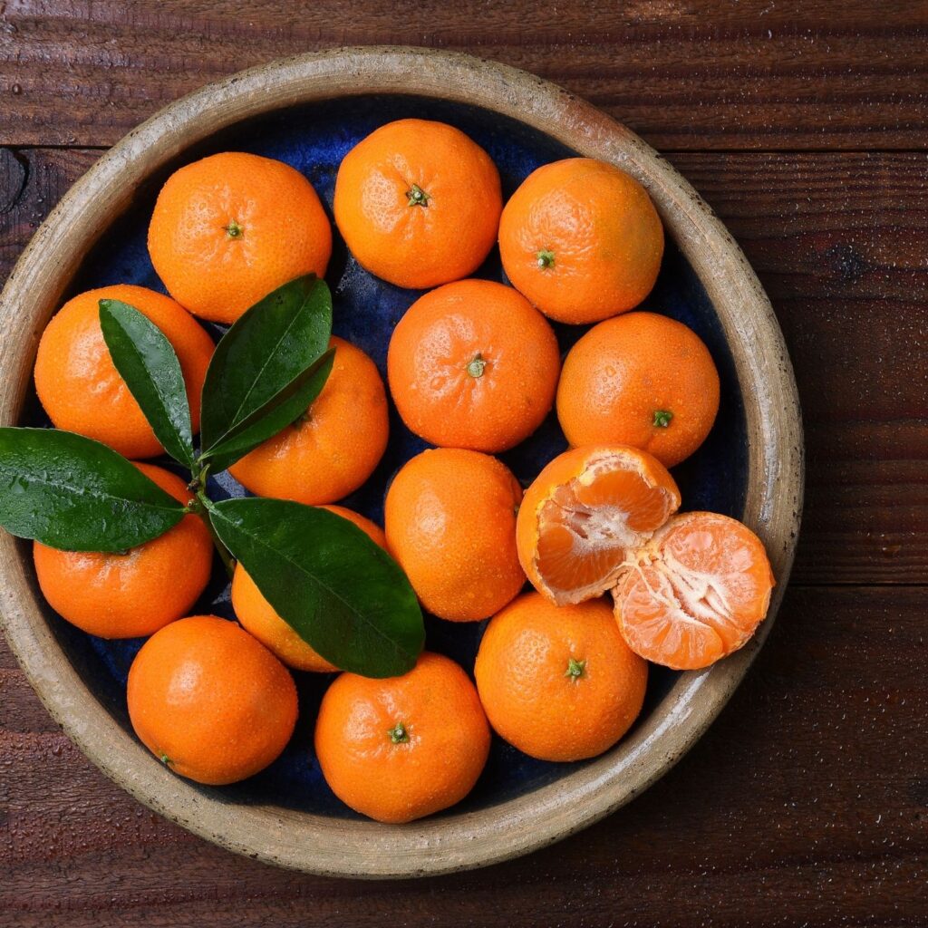 Fresh Mandarin Oranges in a Wood Bowl