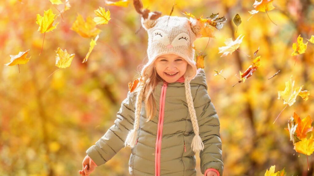 The Best Fall Aesthetics - Girl in Owl Hat with Fall Leaves