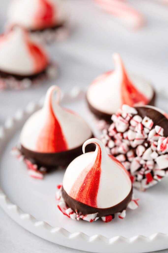 Hot Chocolate Bar Ideas - Peppermint Meringue Kisses Dipped in Dark Chocolate 
