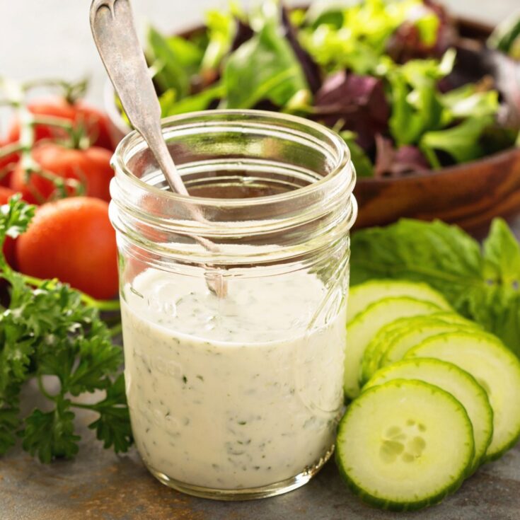 Easy Ranch Dressing Recipe in a Mason Jar with Salad Greens