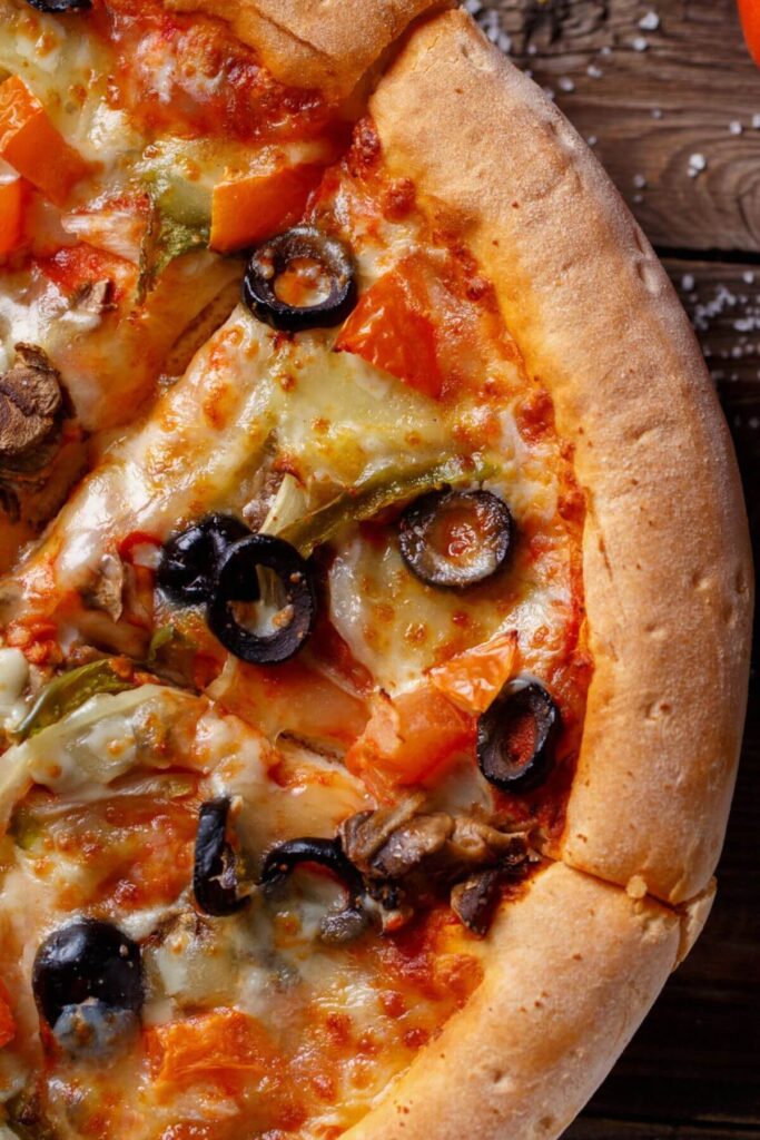 The Best Pizza Toppings - Photo of a Pizza with Sliced Black Olives