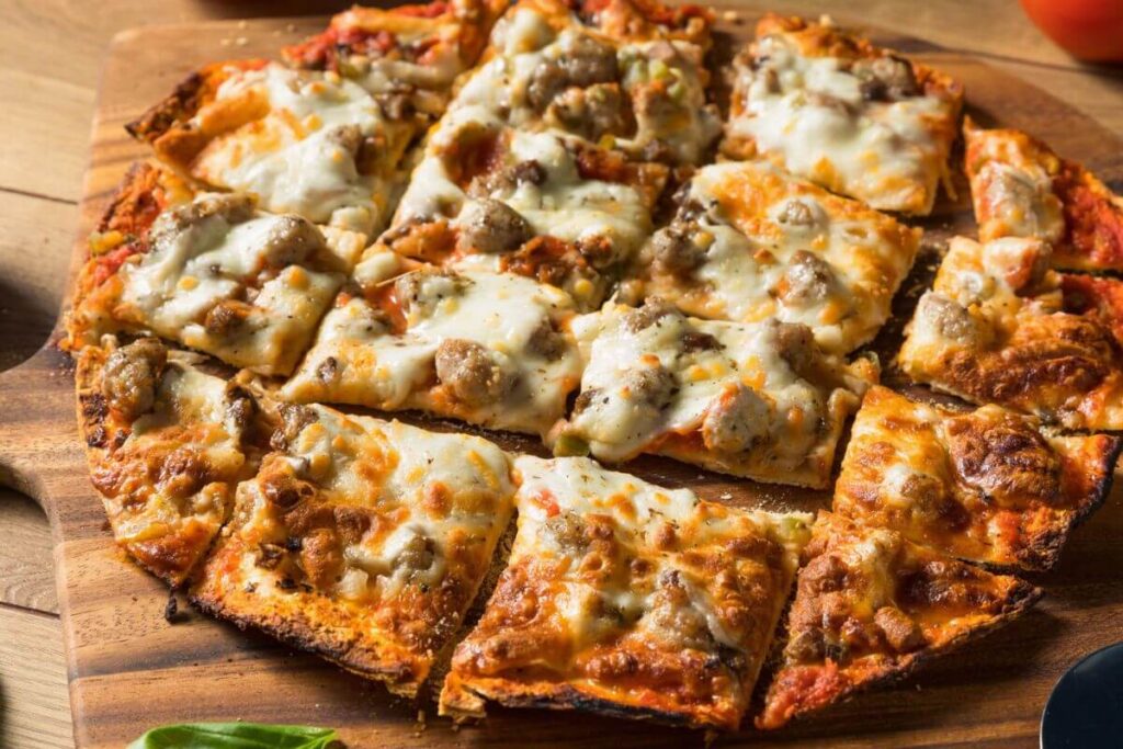 Ultimate List of Pizza Toppings * Photo of Homemade Pizza with Sausage 