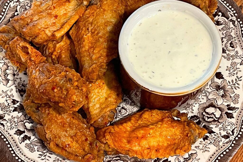 Photo of Parmesan Dip for Chicken Wings on a Plate