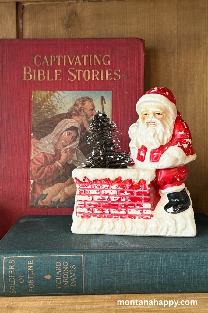 Vintage Christmas Decor - Photo of Vintage Santa Figurine with Vintage Books