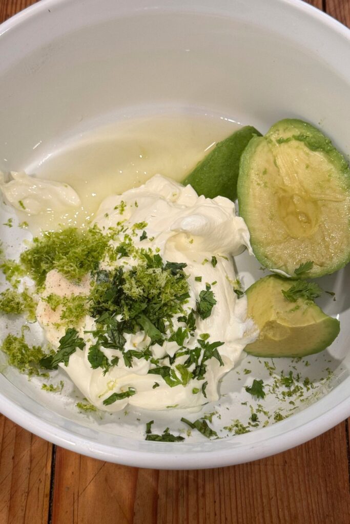 Ingredients for Avocado Lime Crema Recipe In a Bowl 
