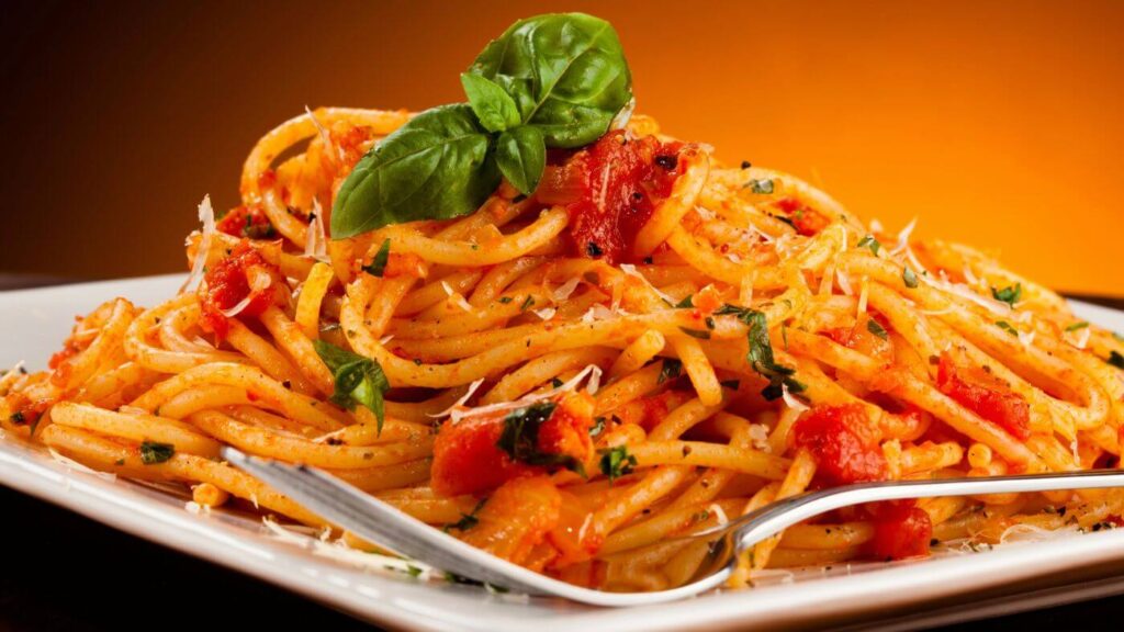What to Do with Basil Leaves * Photo of Pasta with Basil and Tomatoes