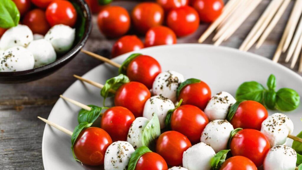 What to do with Basil Leaves - Photo of Cherry Tomatoes, Mozzarella Balls, & Basil Leaves Appetizer