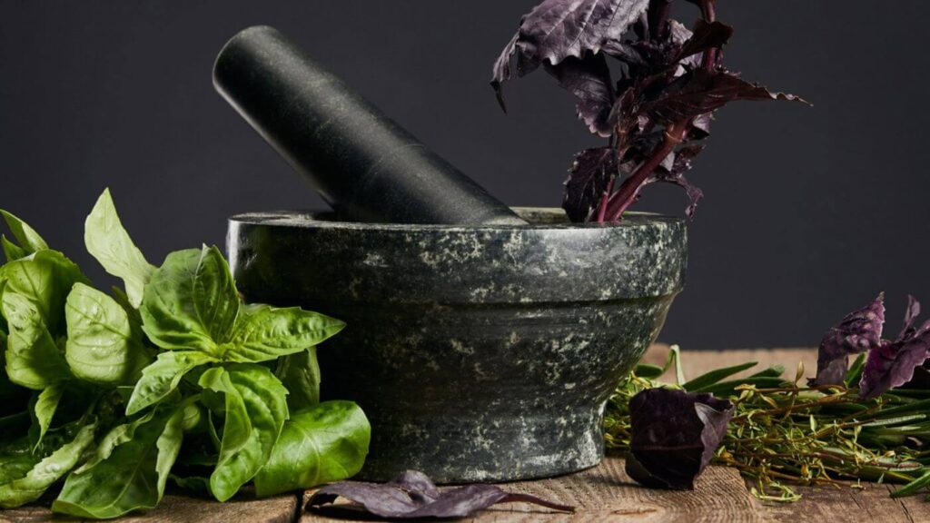 What to do with Basil Leaves - Photo of Mortar and Pestle with Fresh Basil Leaves