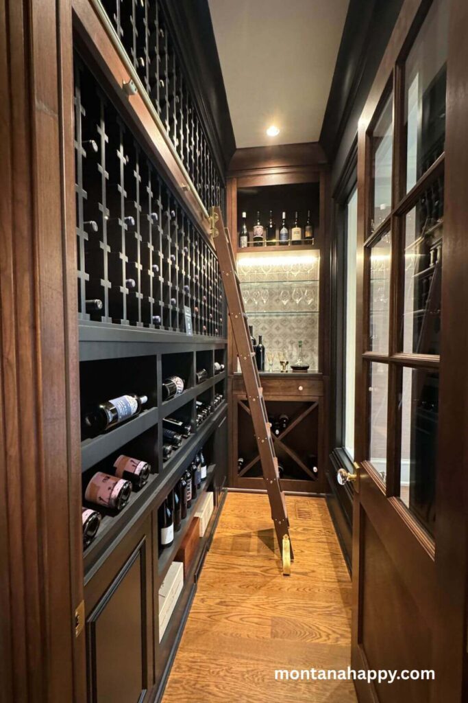 Modern Home Decor Ideas - Modern Wine Storage Wall -A liquor storage area in rich, dark wood feels timeless and refined, creating a warm, club-like atmosphere. The deep tones showcase every bottle beautifully, adding a touch of sophistication to the space.