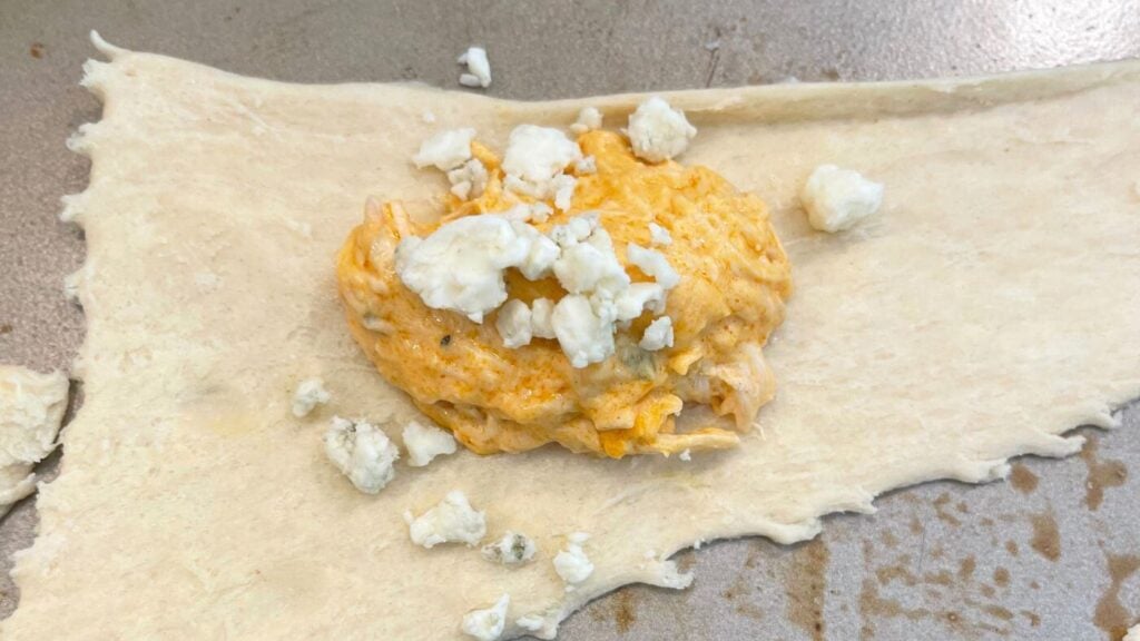 Buffalo Chicken Stuffed Crescent Rolls Recipe - Photo of Buffalo Chicken Stuffing in Crescent Roll 