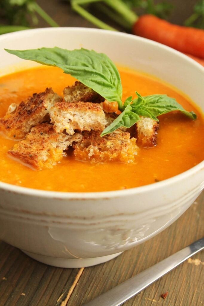 Photo of Carrot Ginger Soup Recipe with Croutons and Fresh Basil