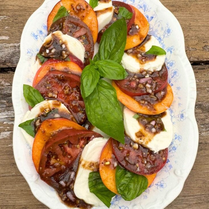 Photo of Peach Caprese Salad for Grilled Chicken on an Oval Platter