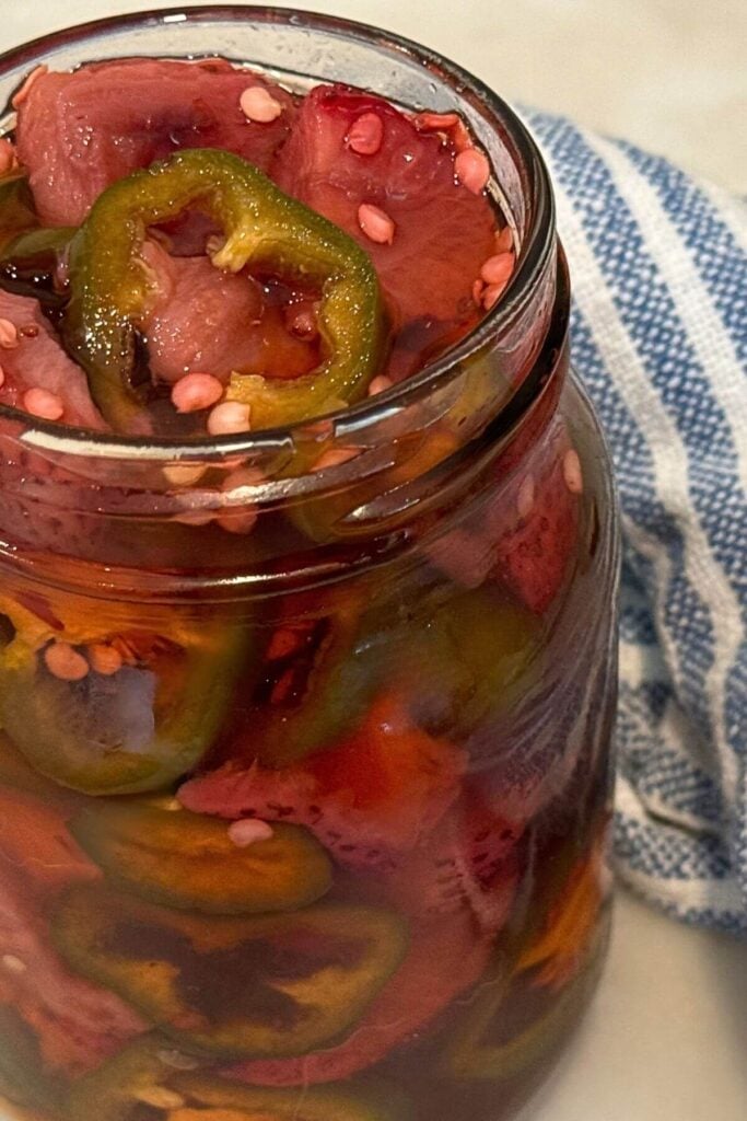 Photo of a Mason Jar with Quick Pickled Roasted Strawberry Jalapeños 