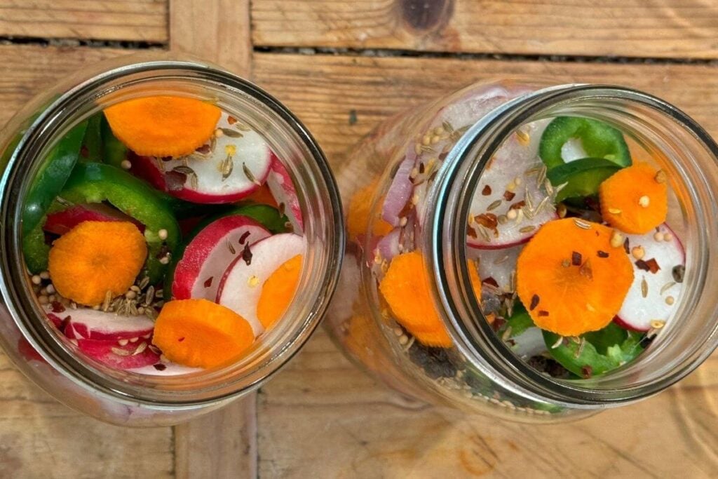 Photo of Taco Quickles Mason Jars with Vegetables and Seasonings 
